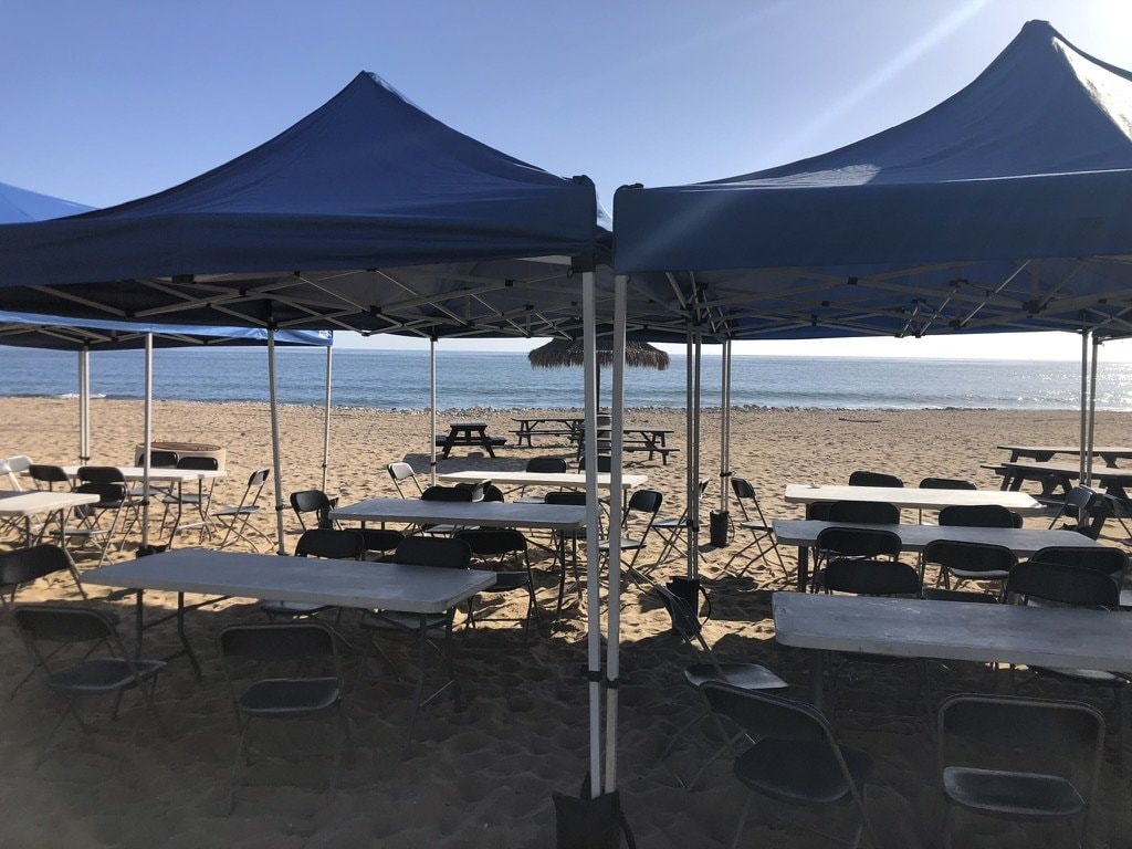 Sunset lunch tents on the beach with ocean views